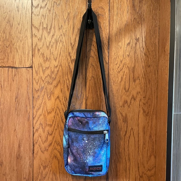 Jansport Handbags - Final price 🤍 Jansport crossbody galaxy space star’s universe carry purse bag